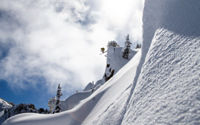 Skier Madison Rose Ostergren sends it off of the famous and massive A-frame hit in Utah's Little Cottonwood Canyon.