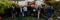 The crew working on the short film standing for a group photo in a back garden