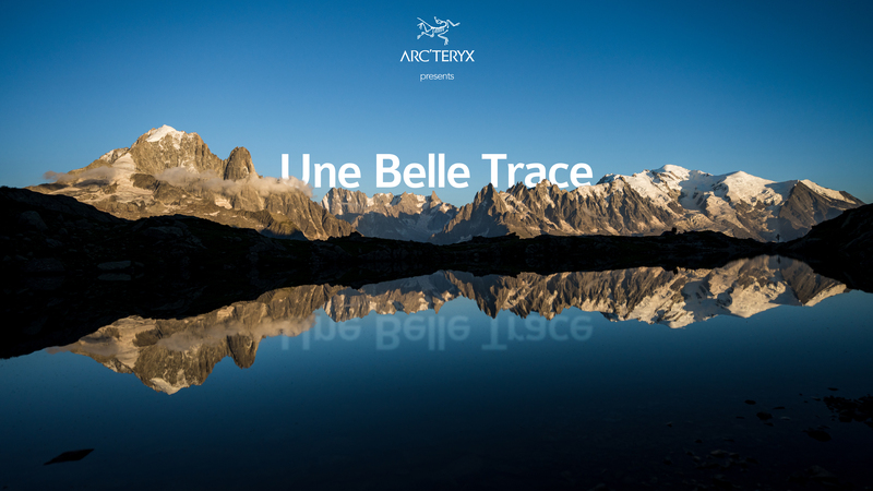 a mountain landscape behind a lake with the words Une Belle Trace above the mountains