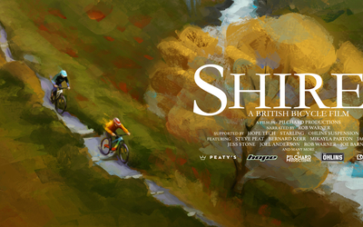 Fergus Lamb and Joe Barnes descending a trail in the Scottish Highlands.