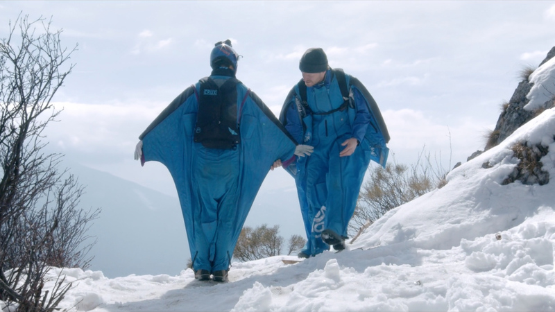 Wingsuit couple standing at an exit Point