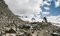 Sam Dale riding down a glacier