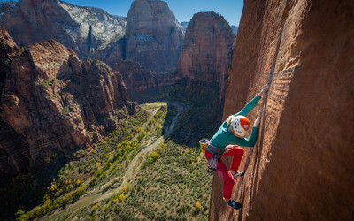 A climber, on a finger crack, in Zion National Park