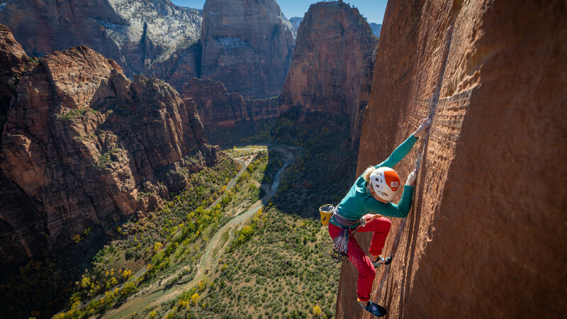 A climber, on a finger crack, in Zion National Park