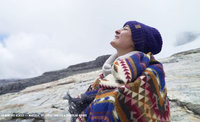 Marcela watching the skies from a glacier site