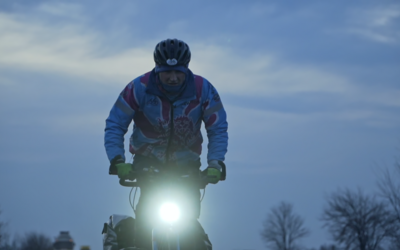 Luke rides his tandem bike through the cold dark night in Ukraine