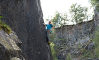 Pete Whillance climbing a new route in Moss Rigg Quarry, Cumbria