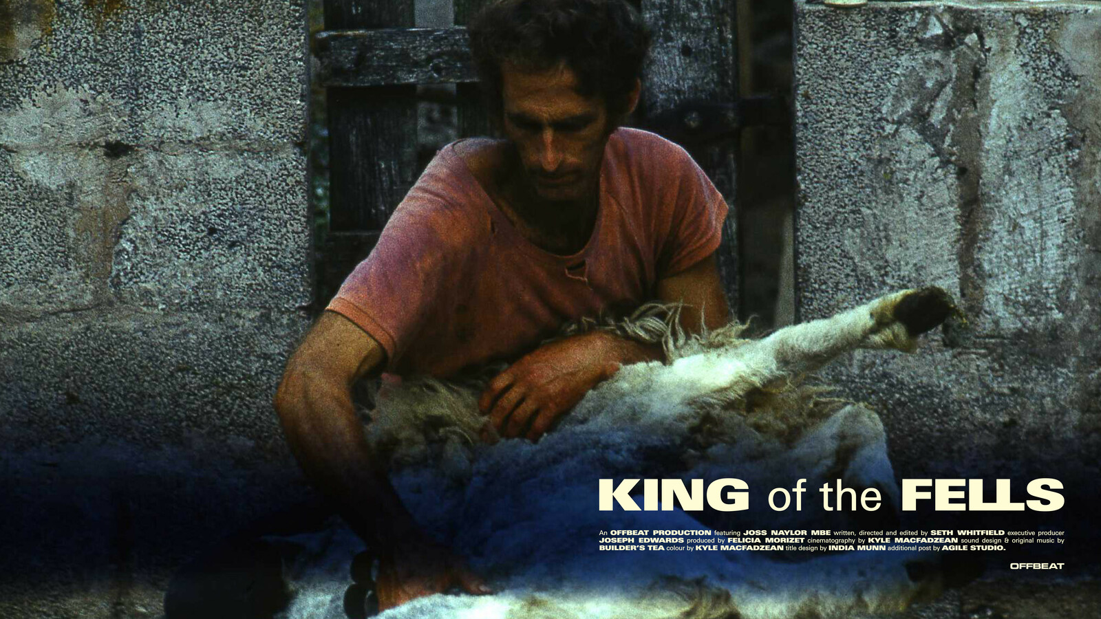 Joss Naylor sheering a sheep with film titles 