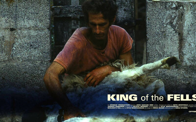 Joss Naylor sheering a sheep with film titles 