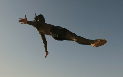 Momo captured mid air.