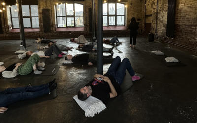 Image of people taking part in a breathwork practice 