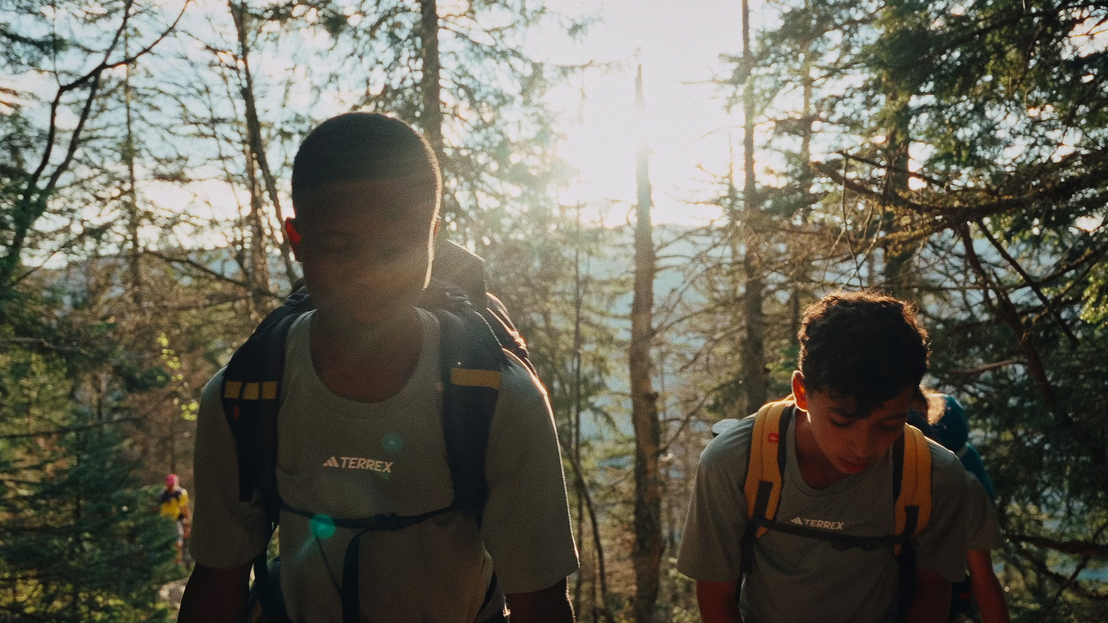 2 Kids from climbing up the mountain together