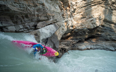 Nouria Newman Kayaking on a Waterfall