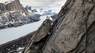 Sarah and Erik enjoying the stunning view of Stewart Lake from the first pitch of their climb.