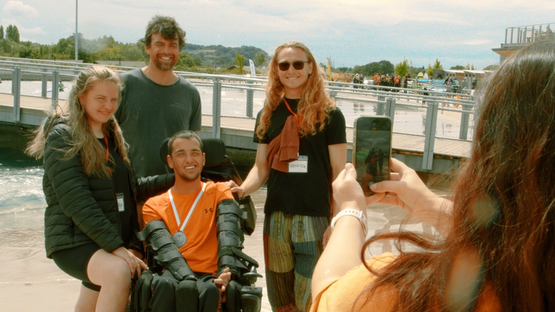 The surfing team posing for a photo