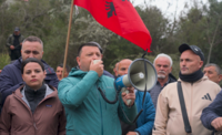 Besjana and Olsi leading a protest to protect the Vjosa river.