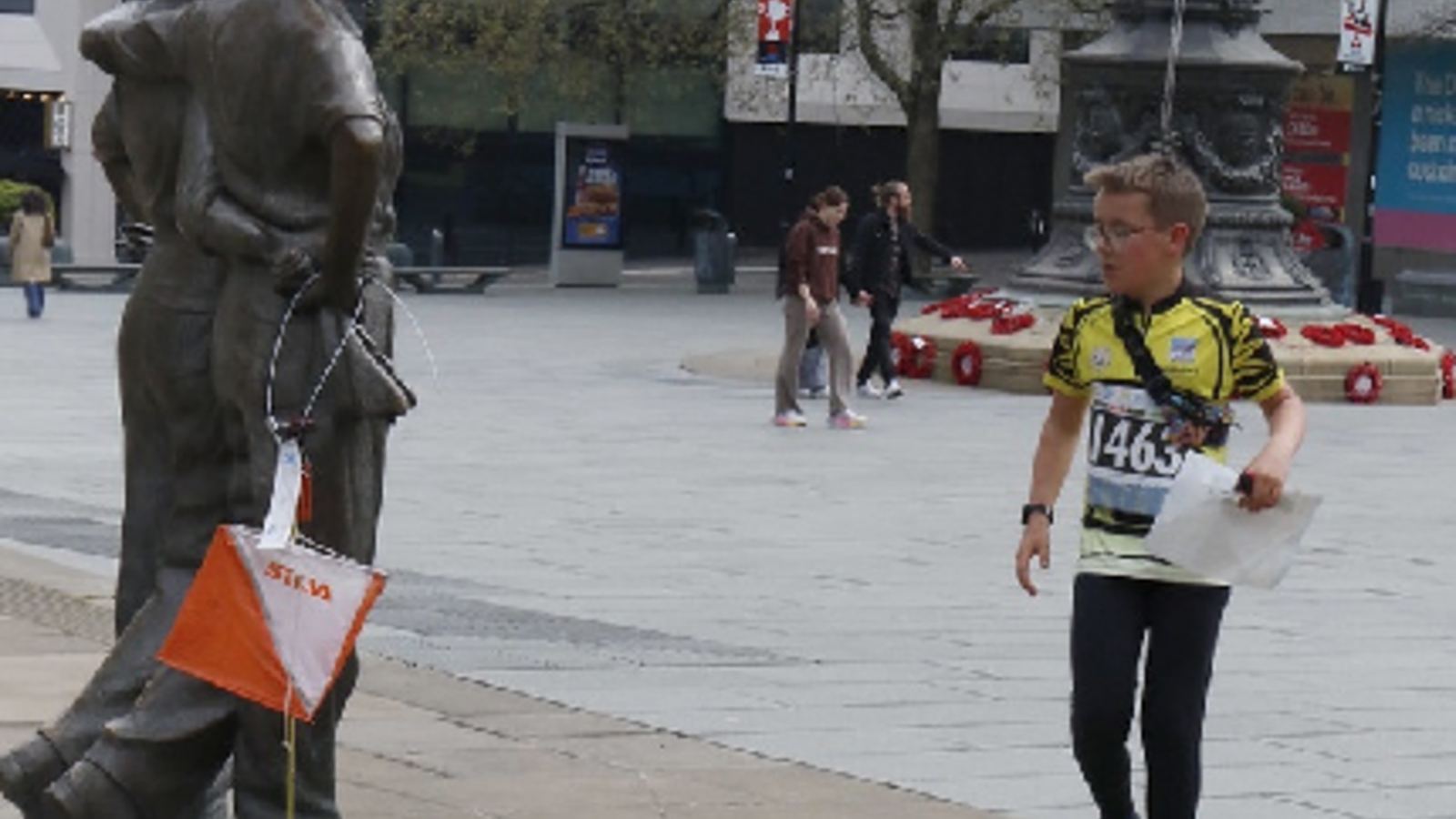 a young boy orienteering in sheffield city centre